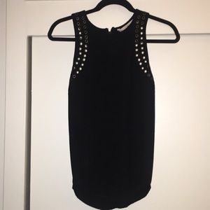 Black tank top with gold rivet details